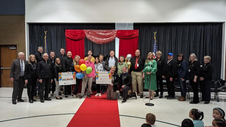 Mrs Blodgett recieving her award with family and JSD commity Majestic